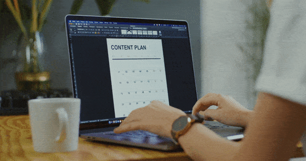 Real estate agent creating a digital content calendar