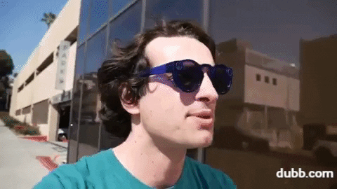 Dubb Creative Director Walks Past a Building